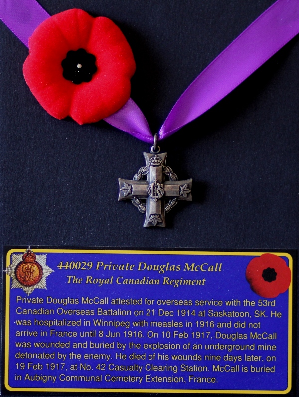 The silver Memorial Cross sent to Private Douglas McCall's mother after his death.