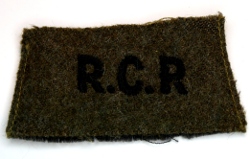 Narrow worsted title with black embroidery. Photo by Capt M. O'Leary (Private Collection)