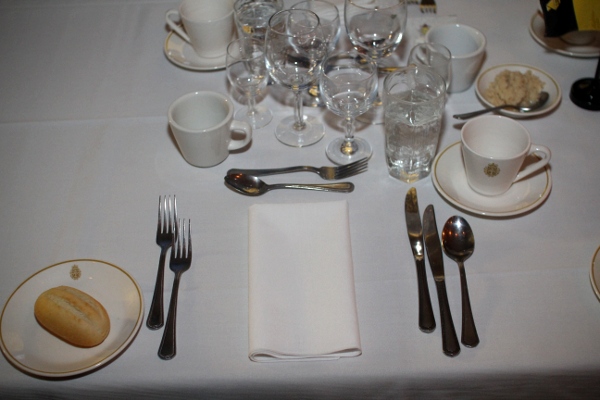 A typical table setting for a four-course meal (soup, salad, entree, dessert).