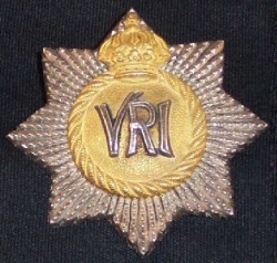 1894 Guelphic crown pattern badge worn by The RCR between 1894 and 1919