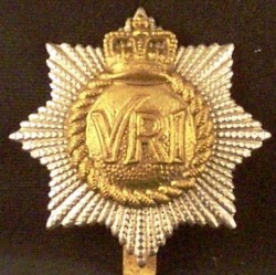 The later pattern of the Imperial crown badge of The RCR